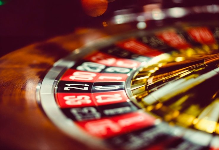 Live dealer conducting a blackjack session at slot batik77 card games studio